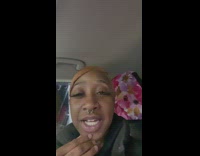 GIrl with orange hair that is peeling like a cap 