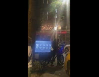 Guy on bike with TV screen having trouble with display