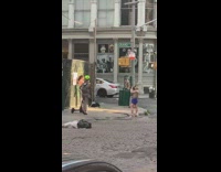 White jumpsuit girl construction fence green helmet 