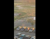 2 girlfriends wave their hands in the air for video 