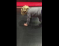 Baby jumps off ledge onto indoor trampoline and does a scorpion