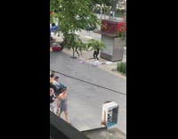 Girl twin tails dance beside closed stall