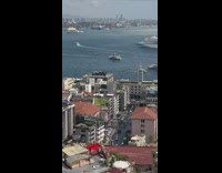 Woman in red dress poses in the rooftop with birds Part 1