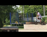 Yellow pants girl flips blue trampoline backyard