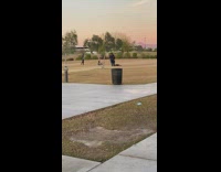 Man jump shot spread arms legs park