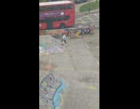 Guy jump towards camera on skate park