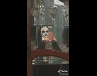 Collab BitchIG2 - Reflection of mom wearing nun halloween costume on glass