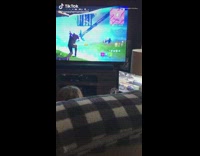 Mom plays fornite video game on television 