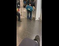 Guy kisses ferret puts inside animal crate