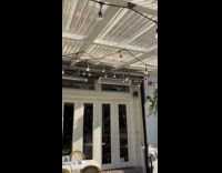 Car charges battery on the store sidewalk