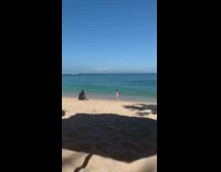 girl pink run half jumps beach