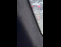 Slingshot cars with lights parked on road