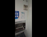 Classy music inside restroom with clogged toilet