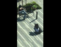 Black metal chair cement tiling 