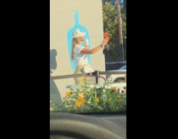 Woman selfie coffee blue jar painting wall