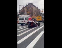 Super Mario drives kart around the city