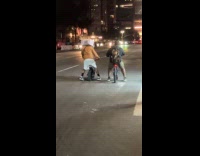 Collab WINY - Guy rides bike wears microwave as helmet