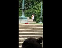 White shirt guy tiktok dance park lamppost 