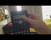 Guy throws black calculator doesnt break 