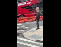 Guy wears strange headpiece covering his face