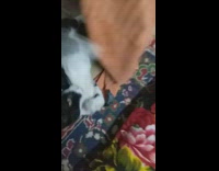 Cat grabs towel from girl trying to take it