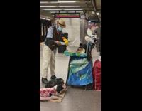 Guy at subway station with various animals 