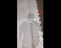 Girl skates on plastic ice rink