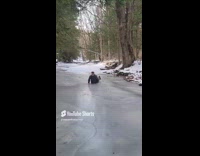 Guy runs on ice slips hits face