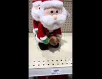 Santa dog riding dog on shelf