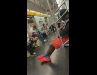 Man wearing purple devil horns mask