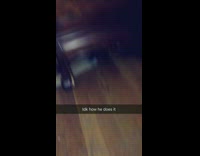 German shepherd puppy stuck under wood dresser 