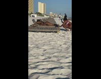 Lady in Pink Bikini Lays on Belly for Beach Photos Part 1