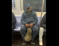 Collab winy - Man wears scrolling message cap on subway