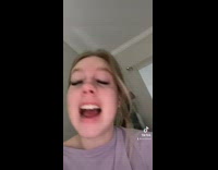 Girl talks about her ripped shirt cats fighting 