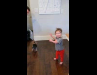 Little girls gets excited dad comes home