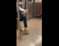 Collab Subway Creatures - Man holds his feet on the train