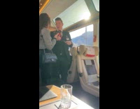 Two women escorted away from train carriage