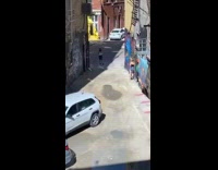 Black shirt girl alley graffiti art poop