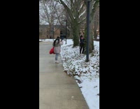 photo wearing college shirt on campus