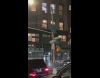 Guy stands on yellow pedestrian light 