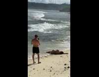 Woman bikini lie down sideways beach photo