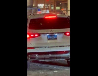 White car bounce in middle of road