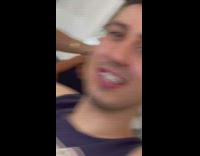 Lady wearing white bikini takes selfie phone 