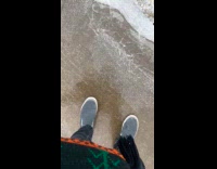 Guy walk and slip on the ice