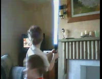 Kid plays with the lightsaber and hits younger brother