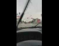 Lightning strike with delayed thunder sound at stoplight