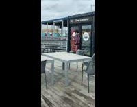 Girl wearing blue pants and roller skates