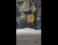 Girl wearing inflatable reindeer costume shakes butt 