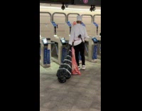 Guy dressed as chef pulling dead body