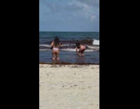 Two women in bikini poses at the beach Part 3